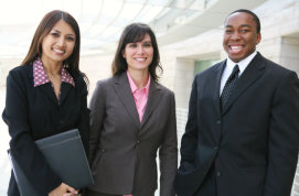 group of professionals smiling to the camera