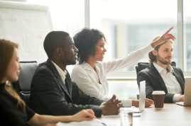 group of professionals having session in a meeting room