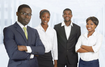 group of professionals smiling to the camera