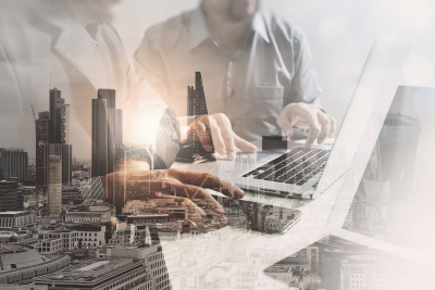 Double exposure of success businessman working in office with digital tablet laptop computer